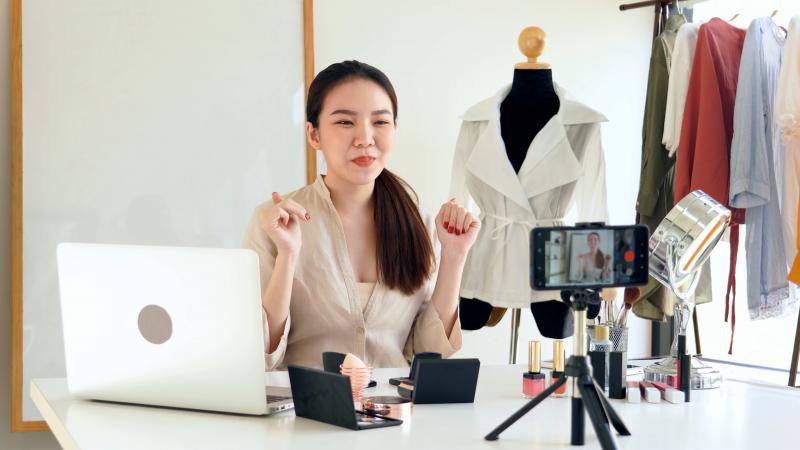 excited woman working and filming image